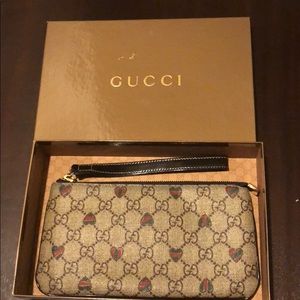 gucci brown wristlet!